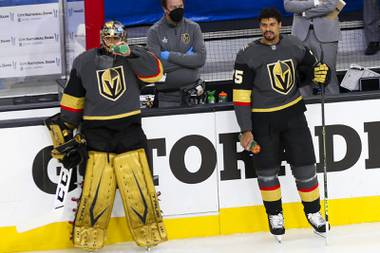 Vegas Golden Knights goaltender Marc-Andre Fleury (29) and Vegas Golden Knights right wing Ryan Reaves (75) stand on the ice prior to Game 7 of an NHL hockey Stanley Cup first-round playoff series against the Minnesota Wild at T-Mobile Arena Friday, May 28, 2021.
