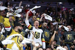 Vegas Golden Knights fans cheer during the first period of Game 3 of an NHL hockey Stanley Cup second-round playoff series against the Colorado Avalanche at T-Mobile Arena Friday, June 4, 2021.