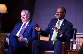 Nevada Attorney General Aaron Ford, right, speaks during a panel discussion on police reform in the Mob Museum's historic courthouse in downtown Las Vegas Tuesday, June 8, 2021. Rick McCann, chief legislative lobbyist for the Nevada Association of Public Safety Officers, listens at left.