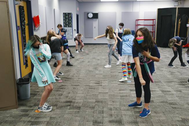 Students attend stage combat class during summer session at Thurman White Academy of the Performing Arts in Henderson Wednesday, June 9, 2021.