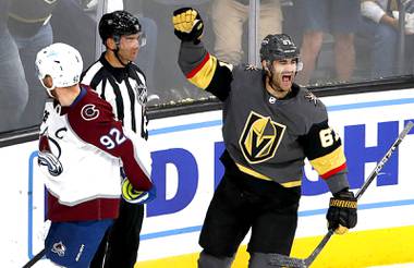 Vegas Golden Knights left wing Max Pacioretty (67) celebrates after scoring an empty net goal during the third period in Game 6 of an NHL hockey Stanley Cup second-round playoff series at T-Mobile Arena Thursday, June 10, 2021. Colorado Avalanche left wing Gabriel Landeskog (92) is at left. The Golden Knights beat the Avalanche 6-3 to advance to the third round. 