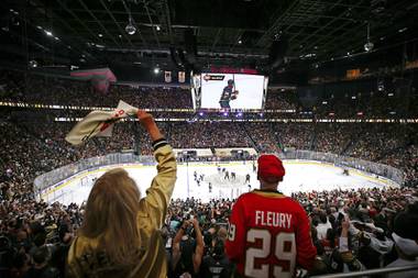 Vegas Golden Knights fans cheer during the third period in Game 6 of an NHL hockey Stanley Cup second-round playoff series at T-Mobile Arena Thursday, June 10, 2021. 