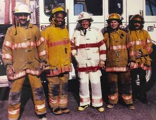 Las Vegas Fire & Rescue Chief Clell West poses with fire department personnel in this undated photo. West, a revered official who retired in 1996, died on May 29. He was 86.