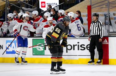 Vegas Golden Knights right wing Keegan Kolesar (55) skates by as Montreal Canadiens right wing Josh Anderson (17) is congratulated by teammates after scoring in the second period of Game 2 of an NHL hockey Stanley Cup semifinal playoff series at T-Mobile Arena Wednesday, June 16, 2021. 