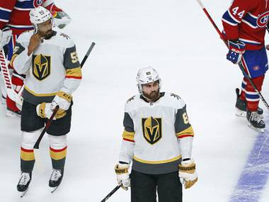 Vegas Golden Knights’ Keegan Kolesar, left, and Alex Tuch skate off the ice after the team’s loss to the Montreal Canadiens in overtime in Game 3 of an NHL hockey semifinal series, Friday, June 18, 2021, in Montreal. (Paul Chiasson/The Canadian Press via AP)
