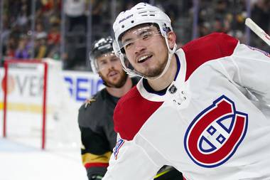 Montreal Canadiens center Nick Suzuki celebrates his open-net goal during the third period in Game 5 of a semifinal playoff series against the Vegas Golden Knights Tuesday, June 22, 2021, in Las Vegas. The Canadiens won 4-1. 