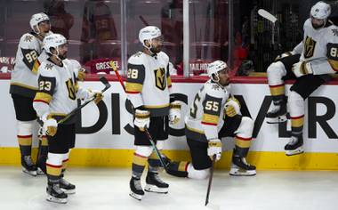 Vegas Golden Knights players watch the Montreal Canadiens celebrate following overtime in Game 6 of an NHL hockey Stanley Cup semifinal playoff series Thursday, June 24, 2021 in Montreal. (Ryan Remiorz/The Canadian Press via AP)