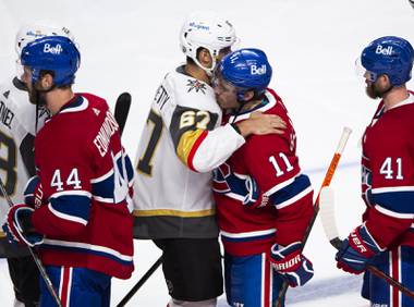 Vegas Golden Knights left wing Max Pacioretty (67) congratulates former teammate Montreal Canadiens’ Brendan Gallagher (11) following overtime in Game 6 of an NHL hockey Stanley Cup semifinal playoff series Thursday, June 24, 2021 in Montreal. (Ryan Remiorz/The Canadian Press via AP)