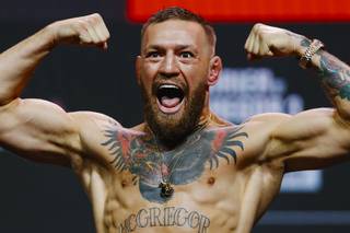 Conor McGregor poses during the UFC 264 ceremonial weigh-in at T-Mobile Arena Friday, July 9, 2021.
