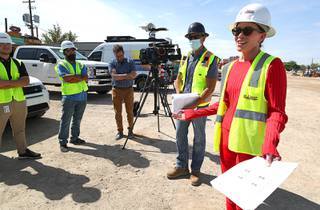 Maureen Schafer, right, CEO of Nevada Health and Bioscience Corporation (NHBC), speaks to journalists before a tour of the Medical Education Building (MEB), the first building of the Kirk Kerkorian School of Medicine at UNLV, under construction at 625 Shadow Lane Wednesday, July 21, 2021.