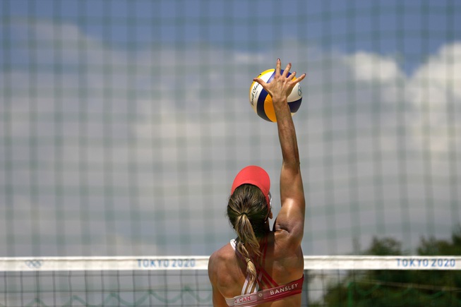 Heather Bansley, from Canada, practices during women's beach volleyball practice ...