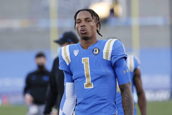 UCLA quarterback Dorian Thompson-Robinson (1) walks off the field before an NCAA college football game between UCLA and Stanford Saturday, Dec. 19, 2020, in Pasadena, Calif.