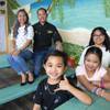 Jeanette and Lefty Battulayan, owners of Lefty-J’s restaurant, sit with their children Jacob, 6, Jade, 11, and Juhl, 14, Friday, July 30, 2021, at the restaurant, 860 E. Twain Ave. Lefty-J’s is just one gathering spot in the Las Vegas Valley for Hawaiians. About 50,000 Hawaiians call Las Vegas home, and community members say they’ve become even closer by caring for each other during the pandemic.