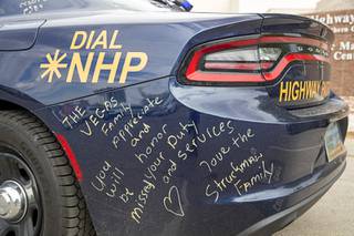 A message is shown on a patrol vehicle that was issued to Nevada Highway Patrol Trooper Micah May at the NHP Southern Command Friday, July 30, 2021. May, 46, died Thursday after he was struck by a carjacking suspect during a pursuit on Interstate 15 on July 27. STEVE MARCUS