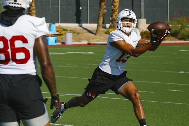 UNLV football wide receiver Kalvin Souders (13) completes a pass during training camp at Bill 