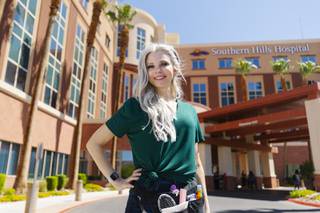Nurse Brooke Johns, who does patients' hair during her 12 hour work shifts, poses for a photo at Southern Hills Hospital Thursday, Sept. 2, 2021.