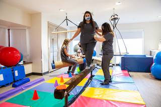 UNLV School of Integrated Health Sciences students work on mobility training practices at the Occupational Therapy lab facility at the Shadow Lane campus, Tuesday Sept. 14, 2021.