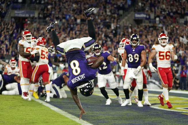 Baltimore Ravens quarterback Lamar Jackson scores a touchdown in the second half of an NFL football game against the Kansas City Chiefs, Sunday, Sept. 19, 2021, in Baltimore. 

