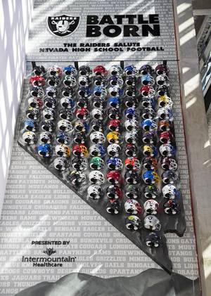 Raiders unveil Nevada high school football helmet wall at