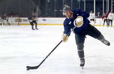 Jack Dugan (8) takes a shot on goal during Vegas Golden Knights Training Camp at City National Arena in Henderson Friday, Sept. 24, 2021.