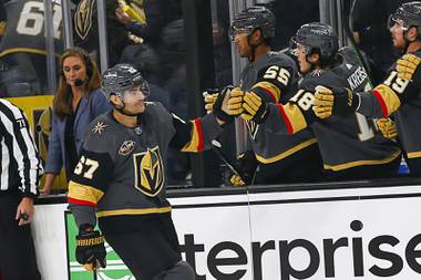 Vegas Golden Knights left wing Max Pacioretty (67) is congratulated after scoring against the Seattle Kraken during the first period of an NHL hockey game Tuesday, Oct. 12, 2021, in Las Vegas.