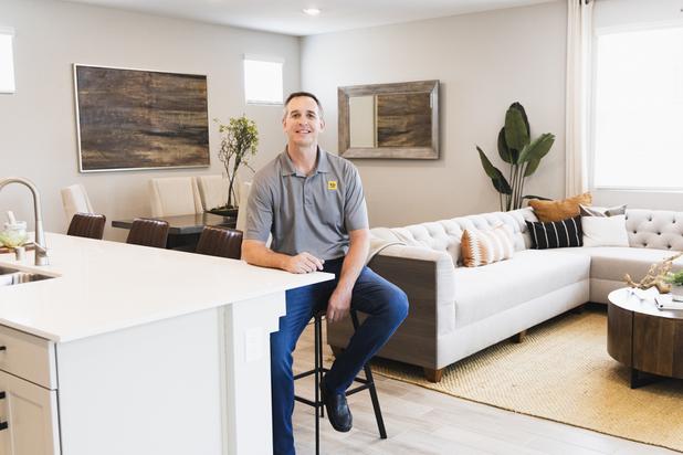 Brian Kunec, KB Home Regional General Manager, poses for a photo inside a model home at the Casa Bella new home development, Wed. Oct. 11, 2021.