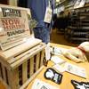 A now hiring sign sits on a display in a clothing store Saturday, Oct. 9, 2021, in Sioux Falls, S.D.