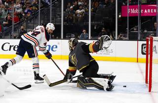 Edmonton Oilers right wing Zack Kassian (44) scores past Vegas Golden Knights goaltender Robin Lehner (90) during the third period of an NHL hockey game Friday, Oct. 22, 2021, in Las Vegas.