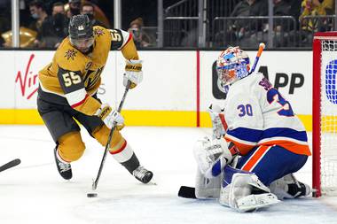 Vegas Golden Knights Keegan Kolesar tries to score on New York Islanders goaltender Ilya Sorokin (30) during the second period of an NHL hockey game, Sunday, Oct. 24, 2021, in Las Vegas. (AP Photo/Rick Scuteri)

