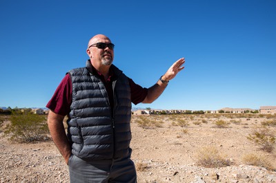 Todd Stratton, President at Kavison Homes, stands on the future site of their upcoming two and three-story "affordable" single-family homes development project in Mountain's Edge, Thursday Oct. 28, 2021.
