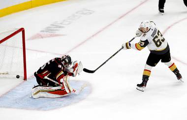 Vegas Golden Knights right wing Evgenii Dadonov (63) scores the winning goal past Anaheim Ducks goaltender John Gibson (36) in a shootout during an NHL hockey game at T-Mobile Arena Friday, Oct. 29, 2021. 