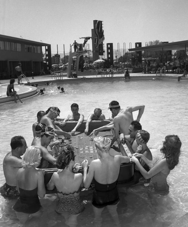 In a scene thought up by Sands publicist Al Freeman and Las Vegas News Bureau photographer Don English, people play craps in the Sands pool June 30, 1953. The concept was a play on the ""floating crap game"" gag in the popular musical ""Guys and Dolls."" CREDIT: Don English/Las Vegas News Bureau