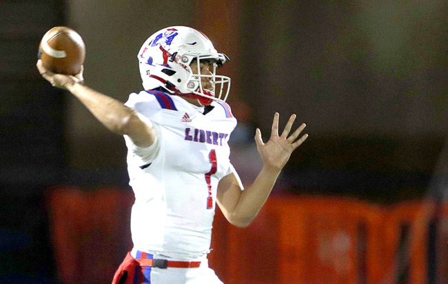 Liberty quarterback Jayden Maiava (1) passes during the first half of the Southern Region football championship against Bishop Gorman at Bishop Gorman High School Friday, Nov. 12, 2021.