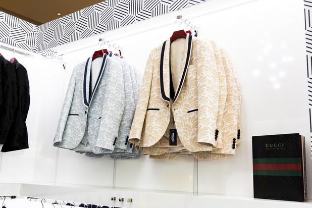 Suit jackets hang on a rack at Maceoo inside Aria Hotel & Casino Thursday, Nov. 11, 2021. Through a partnership with Blueprint sports under the new NCAA NIL rules, former UNLV kicker Michael Chudd, is sponsoring a program where each graduating member of the UNLV football team will receive a custom-made suit from Maceeo ahead of graduation.