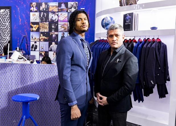 Ricci Lopez, Maceoos Retail and Creative Director, and UNLV football player Noah Bean pose for a photo following a suit fitting at Aria Hotel & Casino Thursday, Nov. 11, 2021. Through a partnership with Blueprint sports, former UNLV kicker Michael Chudd is sponsoring a program (now possible under the new NCAA NIL rules) that will give each graduating member of the UNLV football team a custom-made suit from Maceeo in exchange for social media sharing.