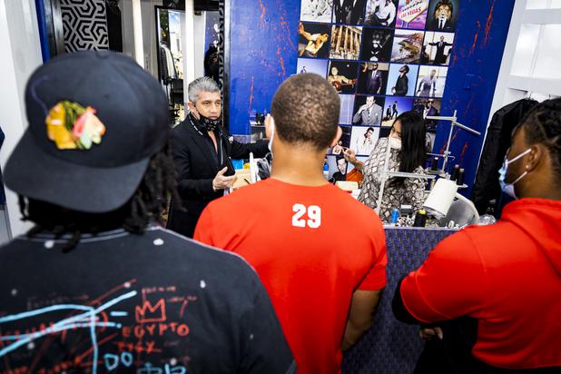 Ricci Lopez, Maceoo Retail and Creative Director, gives UNLV football players Noah Bean, left, Tre Caine, center, and Farrell Hester, right, a tour of the store during a suit fitting at Aria Hotel & Casino Thursday, Nov. 11, 2021. Through a partnership with Blueprint sports, former UNLV kicker Michael Chudd is sponsoring a program (now possible under the new NCAA NIL rules) that will give each graduating member of the UNLV football team a custom-made suit from Maceeo in exchange for social media sharing.