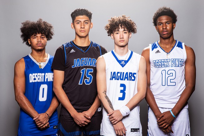 Players of the Desert Pines High basketball team, from left Jamir Stephens, Osvaldo Biebrich, Isiaac Boykin and Evan Tatum, take a portrait during the Las Vegas Sun's High School Basketball Media Day at the Red Rock Resort and Casino, Nov. 1, 2021.