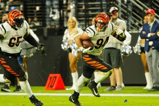 Cincinnati Bengals defensive end Sam Hubbard (94) makes a run after securing a fumble from Raiders quarterback Derek Carr in the fourth quarter of their game at Allegiant Stadium Sunday, Nov. 21, 2021. The Bengals beat the Raiders 32-13.