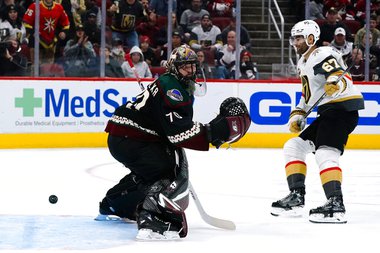 Vegas Golden Knights left wing Max Pacioretty (67) scores a goal against Arizona Coyotes goaltender Karel Vejmelka (70) during the second period of an NHL hockey game Friday, Dec. 3, 2021, in Glendale, Ariz. 