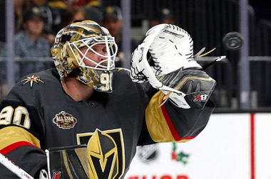 Vegas Golden Knights goaltender Robin Lehner (90) makes a glove save during the second period of an NHL hockey game at T-Mobile Arena Sunday, Dec. 5, 2021. 