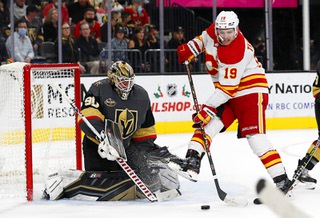 Vegas Golden Knights goaltender Robin Lehner (90)defends against Calgary Flames left wing Matthew Tkachuk (19) during the second period of an NHL hockey game at T-Mobile Arena Sunday, Dec. 5, 2021.