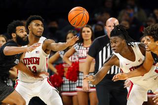 UNLV Rebels guard Bryce Hamilton (13) and forward Victor Iwuakor, right, go after a loose ball during a game against the Seattle Redhawks at the Michelob Ultra Arena in Mandalay Bay Wednesday, Dec. 8, 2021.