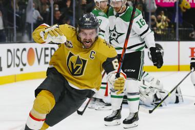 Vegas Golden Knights right wing Mark Stone (61) celebrates after scoring against Dallas Stars goaltender Braden Holtby during the third period of an NHL game at T-Mobile Arena Wednesday, Dec. 8, 2021.