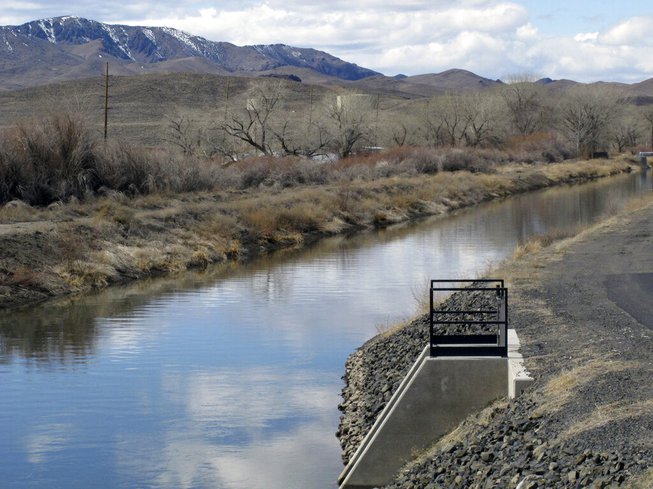 Water flows through the Truckee canal in Fernley in this  March 18, 2021, file photo. The city has a planned project to take surface water from the canal and pipe it to its water treatment plant. 
