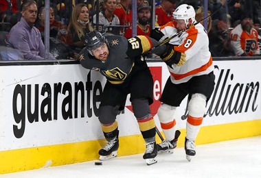 Vegas Golden Knights left wing William Carrier (28) skates against Philadelphia Flyers defenseman Kevin Connauton (8) during the third period of an NHL hockey game at T-Mobile Arena Friday Dec. 10, 2021.