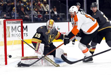 Vegas Golden Knights goaltender Laurent Brossoit (39) defends against Philadelphia Flyers center Kevin Hayes (13) during the second period of an NHL hockey game at T-Mobile Arena Friday Dec. 10, 2021.