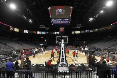 Players from UNLV and Seattle warm up prior to their game Wednesday, Dec. 8, 2021, in a near-empty Michelob Ultra Arena at Mandalay Bay. The arena didn’t get much fuller the rest of the night. Announced attendance was 637.