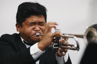 Kurt Tumbagahan plays trumpet during a rehearsal at UNLV Friday, Dec. 10, 2021.