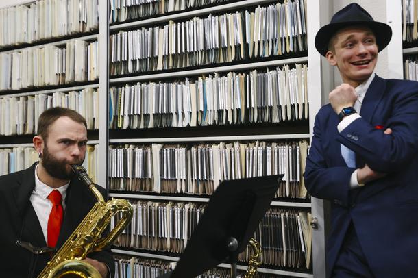 Max Marquis plays baritone sax as vocalist Patrick Hogan listens during a rehearsal at UNLV Friday, Dec. 10, 2021.