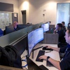 Software engineers develop and test software in the OPTIX offices Wednesday, Dec. 15, 2021.